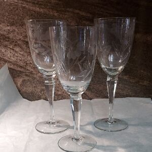 Vintage Hand Blown Weel Cut Floral Design Goblets One Is Half Inch Smaller.  B70